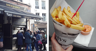 Mensen smullen van een lekkere portie frietjes in de frituur Café Georgette in Brussel.