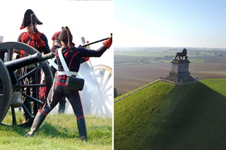 Soldaten tijdens een re-enactment van de Slag van Waterloo en de leeuw van Waterloo